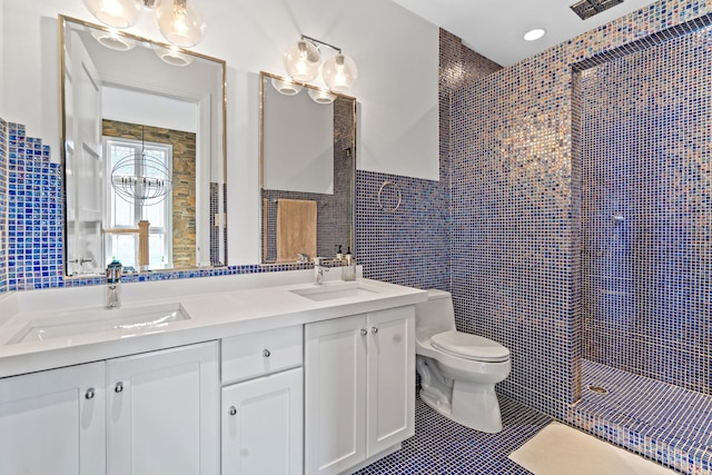 8260 W Argyle St, Norridge, IL 60706 - bathroom with tile walls, toilet, double vanity, tiled shower, and tile patterned flooring