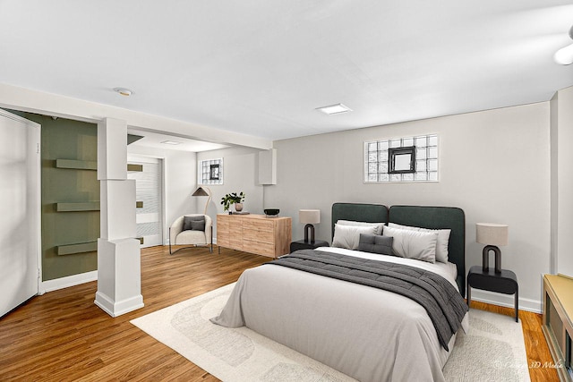 5935 Carol Ave, Morton Grove, IL 60053 - bedroom with wood finished floors and baseboards