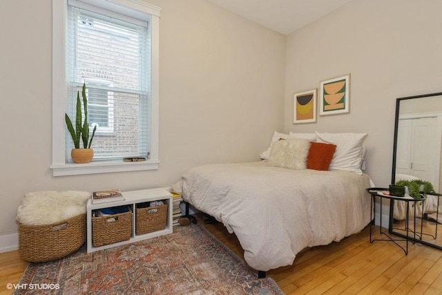 2151 W Cortez St, Chicago, IL 60622 - bedroom with hardwood / wood-style floors and multiple windows