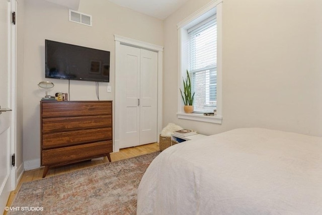 2151 W Cortez St, Chicago, IL 60622 - bedroom with wood finished floors and a closet