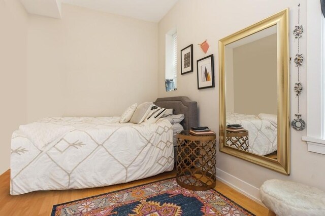 2151 W Cortez St, Chicago, IL 60622 - bedroom featuring wood finished floors and baseboards