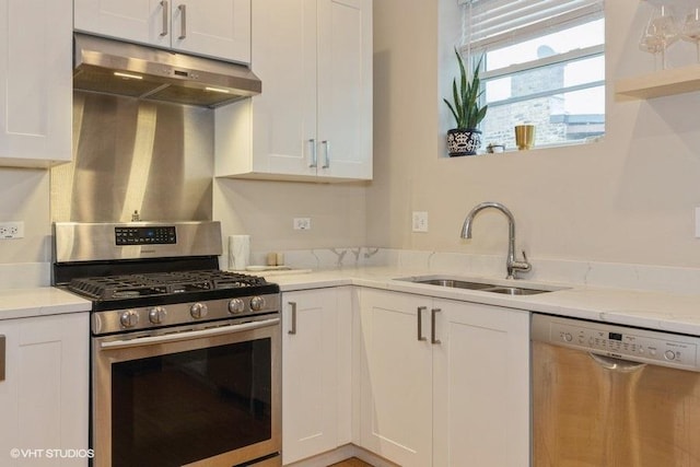 2151 W Cortez St, Chicago, IL 60622 - kitchen featuring stainless steel appliances, under cabinet range hood, a sink, white cabinets, and light stone countertops
