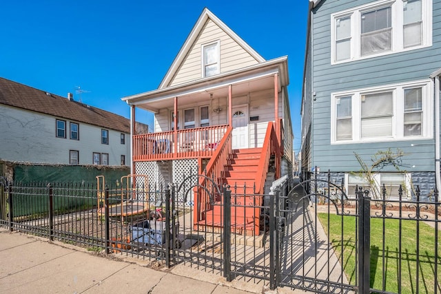 1332 S 50th Ave, Cicero, IL 60804 - view of front of house with a porch, stairs, and a gate