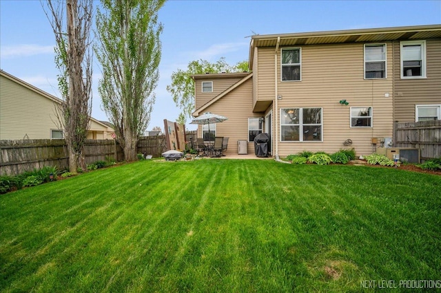 rear view of property featuring a patio area