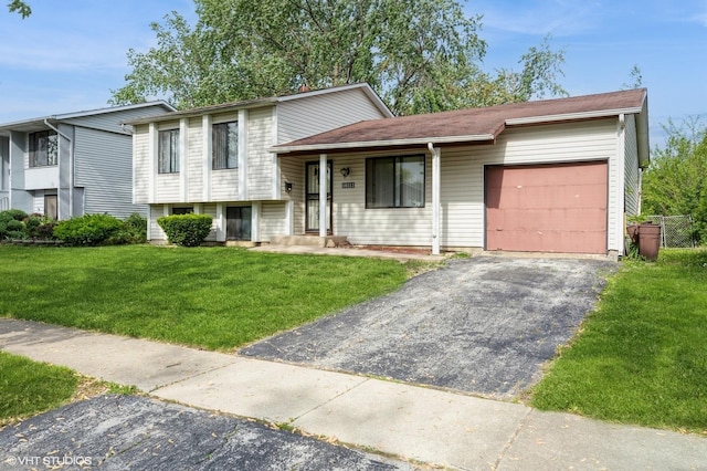 18111 Orleans Dr, Hazel Crest, IL 60429 - split level home featuring a garage, driveway, and a front yard