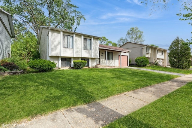 18111 Orleans Dr, Hazel Crest, IL 60429 - tri-level home with a garage, driveway, and a front lawn