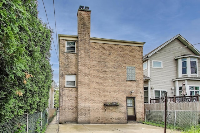 1021 S Blvd, Evanston, IL 60202 - back of property with brick siding and a chimney