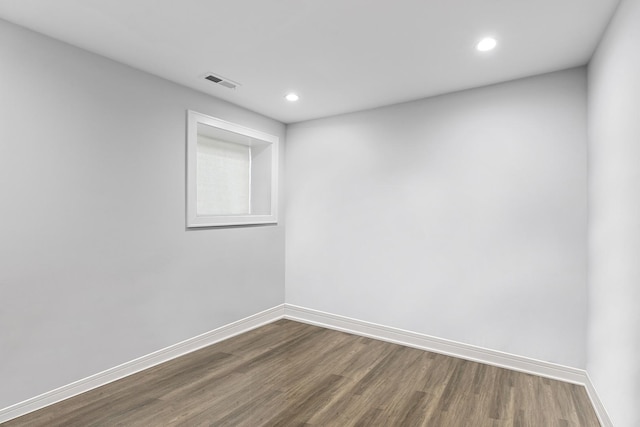 3839 W 14th St, Chicago, IL 60623 - empty room with dark wood-style flooring and recessed lighting