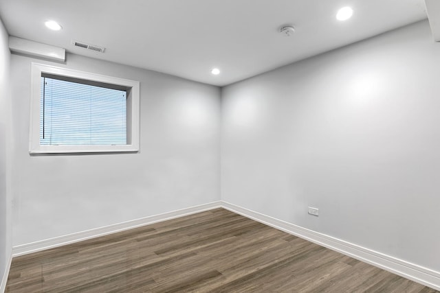 3839 W 14th St, Chicago, IL 60623 - unfurnished room with wood finished floors, recessed lighting, and a smoke detector