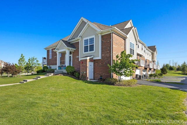4404 Monroe Ct, Naperville, IL 60564 - view of front of property featuring brick siding and a front lawn