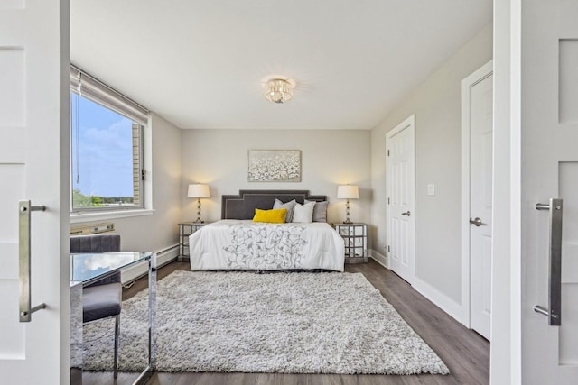 40 N Tower Rd Unit 3G, Oak Brook, IL 60523 - bedroom with dark wood-style floors and baseboards