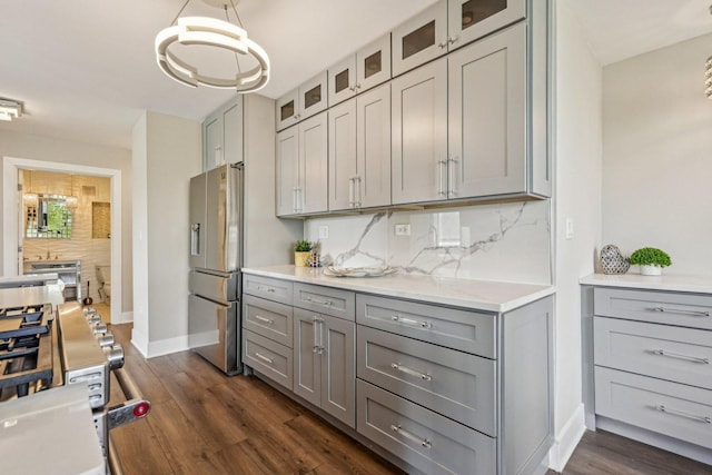 40 N Tower Rd Unit 3G, Oak Brook, IL 60523 - kitchen with stainless steel fridge, gray cabinetry, tasteful backsplash, and light countertops