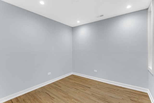 1315 S Kolin Ave, Chicago, IL 60623 - empty room with light wood-style floors, baseboards, and recessed lighting