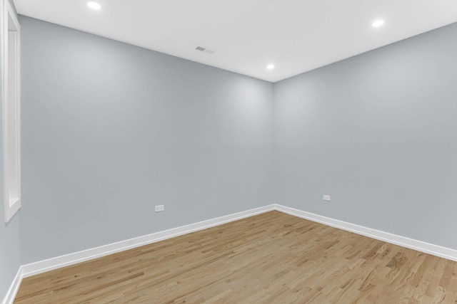 1315 S Kolin Ave, Chicago, IL 60623 - spare room with light wood-style floors, baseboards, and recessed lighting