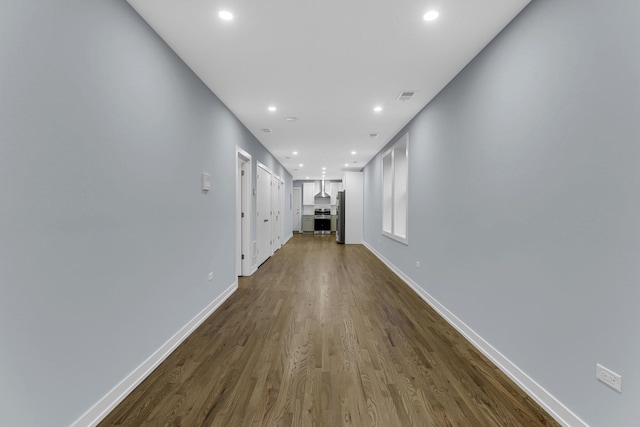 1315 S Kolin Ave, Chicago, IL 60623 - hall featuring recessed lighting, dark wood finished floors, and baseboards