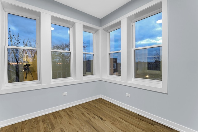 1315 S Kolin Ave, Chicago, IL 60623 - empty room featuring wood finished floors and baseboards