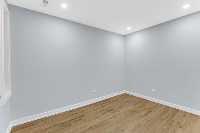 1315 S Kolin Ave, Chicago, IL 60623 - spare room featuring light wood-style floors, baseboards, and recessed lighting