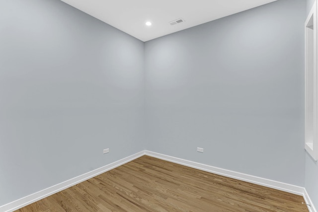 1315 S Kolin Ave, Chicago, IL 60623 - spare room with light wood-type flooring, baseboards, and recessed lighting
