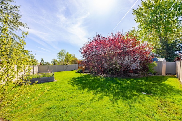 15322 Woodmar Dr, Orland Park, IL 60462 - view of yard with a garden, a storage unit, and an outbuilding