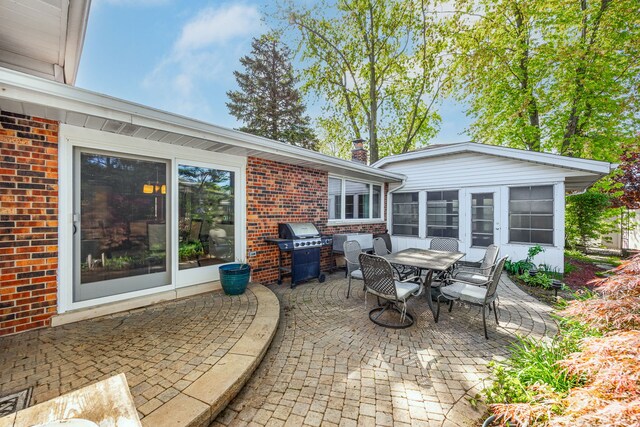 15322 Woodmar Dr, Orland Park, IL 60462 - view of patio with a grill and outdoor dining space