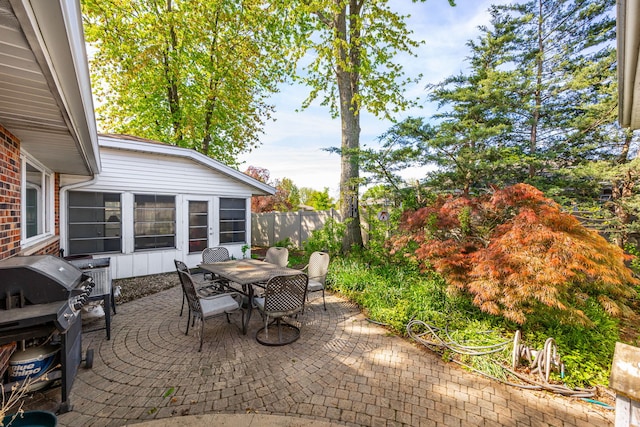15322 Woodmar Dr, Orland Park, IL 60462 - view of patio featuring fence, outdoor dining space, and a grill