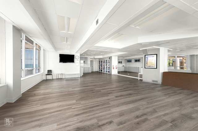 6301 N Sheridan Rd Unit 19O, Chicago, IL 60660 - unfurnished living room featuring wood finished floors, healthy amount of natural light, and baseboards