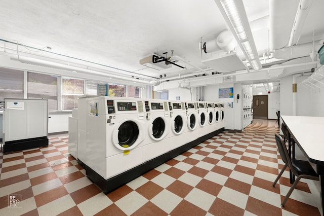 6301 N Sheridan Rd Unit 19O, Chicago, IL 60660 - shared laundry featuring light flooring, washing machine and dryer, and estacked washer and dryer