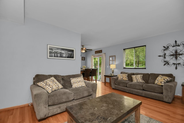16560 Willow Walk Dr, Lockport, IL 60441 - living room featuring light wood-type flooring, ceiling fan, and baseboards