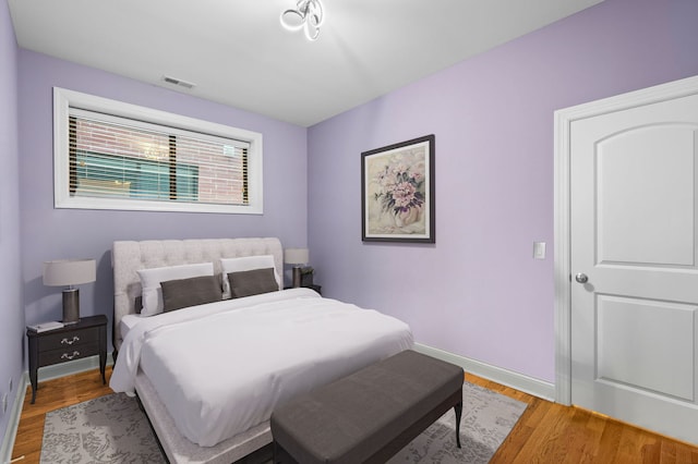 6036 N Damen Ave Unit 1S, Chicago, IL 60659 - bedroom with light wood-style floors and baseboards