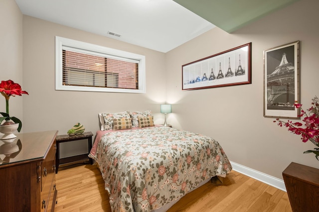 6036 N Damen Ave Unit 1S, Chicago, IL 60659 - bedroom featuring light wood finished floors and baseboards