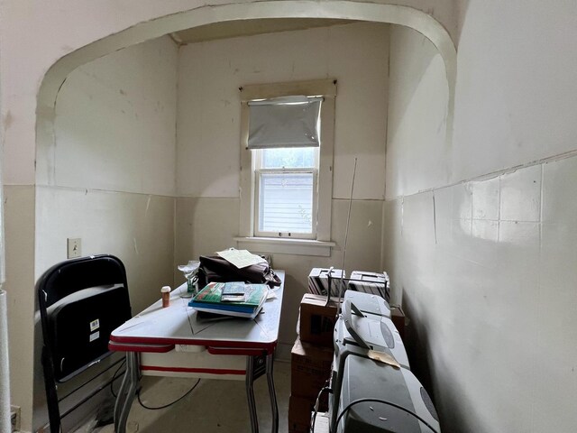 866 E Center St, Paxton, IL 60957 - miscellaneous room featuring arched walkways and concrete floors