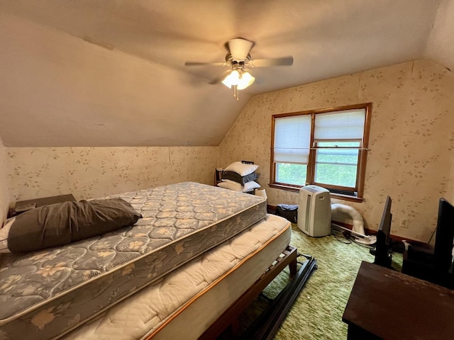 866 E Center St, Paxton, IL 60957 - carpeted bedroom featuring vaulted ceiling, a ceiling fan, and wallpapered walls