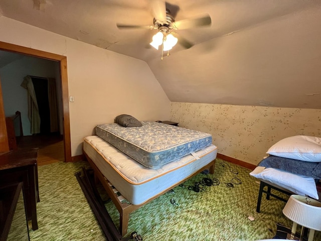 866 E Center St, Paxton, IL 60957 - carpeted bedroom featuring lofted ceiling, ceiling fan, and baseboards