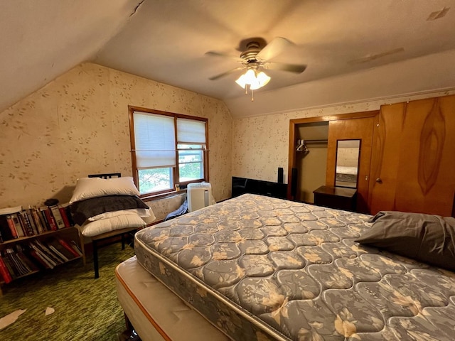 866 E Center St, Paxton, IL 60957 - carpeted bedroom with vaulted ceiling, wallpapered walls, and a ceiling fan