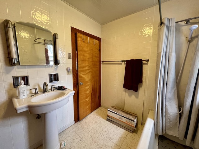 866 E Center St, Paxton, IL 60957 - bathroom with tile walls, a shower with shower curtain, and a bathtub