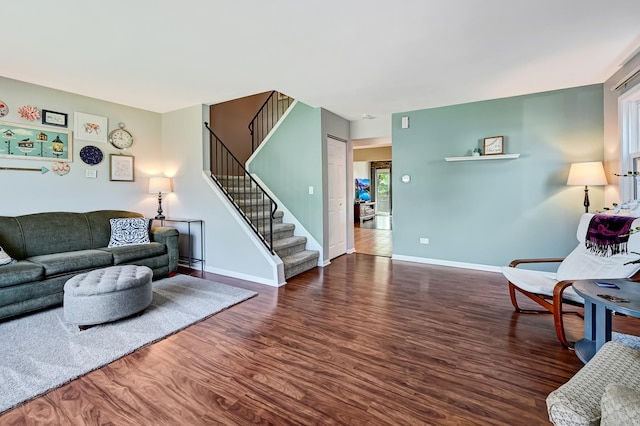 3025 Diane Dr, Aurora, IL 60504 - living area featuring wood finished floors, stairway, and baseboards