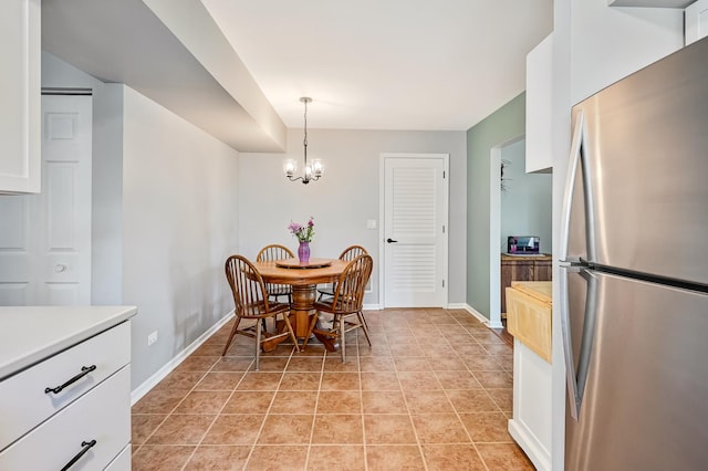 3025 Diane Dr, Aurora, IL 60504 - dining room featuring baseboards and a chandelier