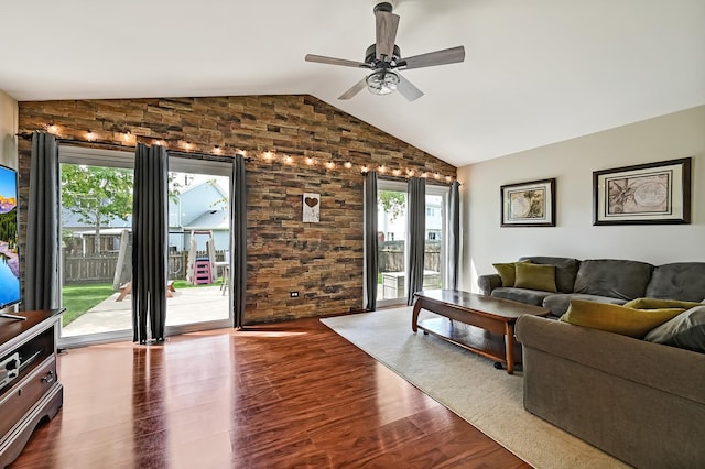 3025 Diane Dr, Aurora, IL 60504 - living room featuring lofted ceiling, ceiling fan, healthy amount of natural light, wood finished floors, and brick wall