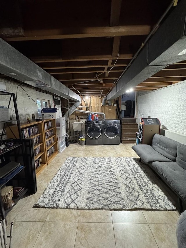 8 W Emerson St, Arlington Heights, IL 60005 - unfinished basement featuring washer and clothes dryer, stairs, tile patterned floors, and a sink