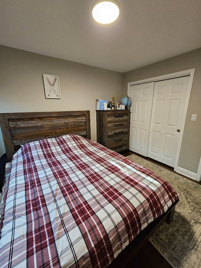 8 W Emerson St, Arlington Heights, IL 60005 - bedroom featuring a closet, carpet floors, and baseboards