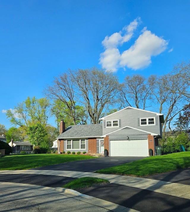 8 W Emerson St, Arlington Heights, IL 60005 - view of front of property with brick siding, driveway, a front yard, and a chimney