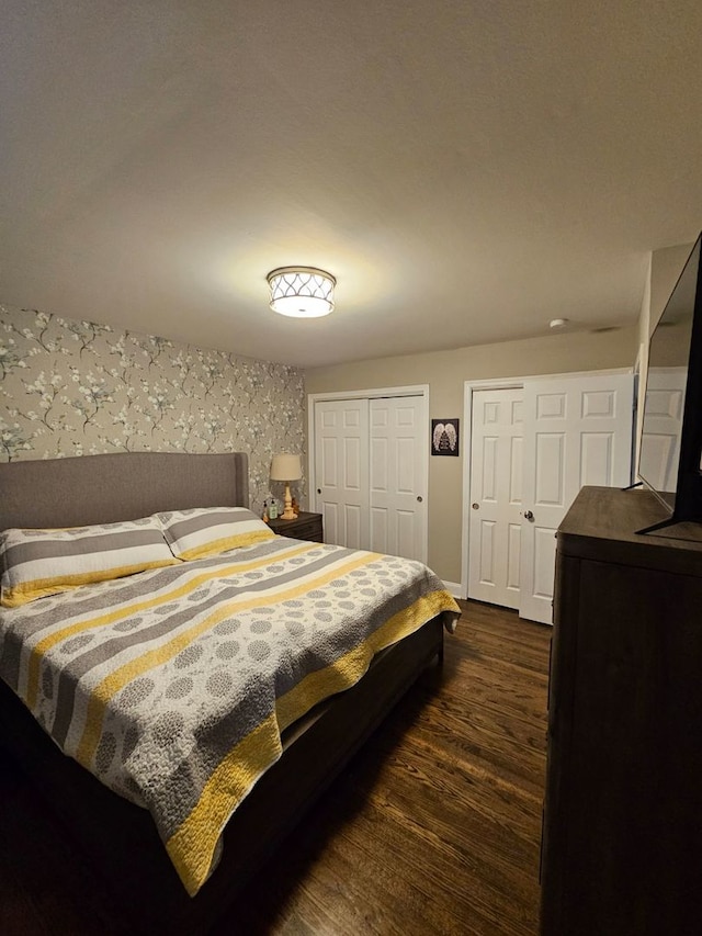 8 W Emerson St, Arlington Heights, IL 60005 - bedroom featuring baseboards and dark wood-style floors