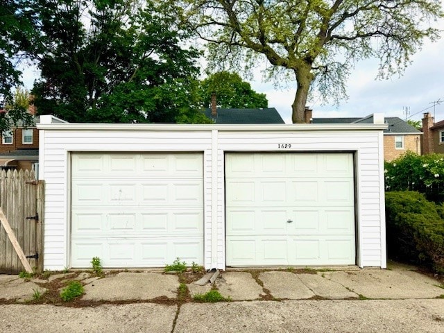garage featuring fence