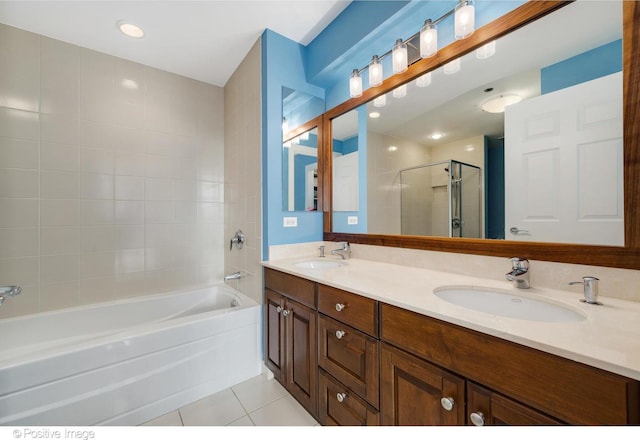21 E Huron St Unit 3204, Chicago, IL 60611 - bathroom with an enclosed shower, tile patterned floors, double vanity, and a tub to relax in