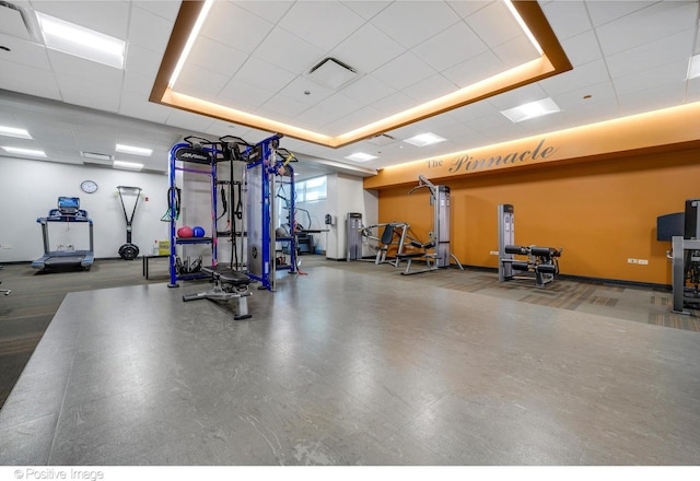 21 E Huron St Unit 3204, Chicago, IL 60611 - gym with a tray ceiling, baseboards, and a paneled ceiling