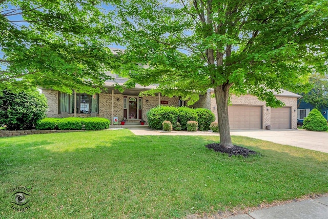 975 S Laura Ln, Coal City, IL 60416 - obstructed view of property with concrete driveway, a front lawn, brick siding, and a garage