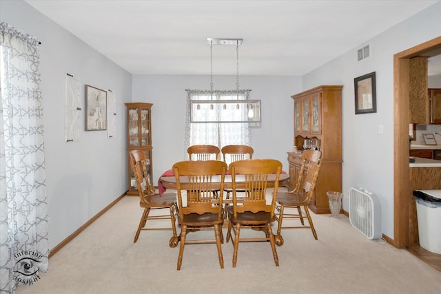 975 S Laura Ln, Coal City, IL 60416 - dining space with light colored carpet and baseboards