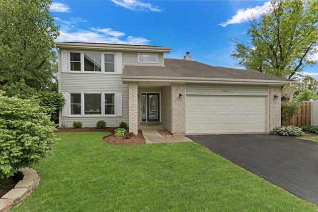 1723 Victor Ter, Gurnee, IL 60031 - view of front of property with asphalt driveway and a garage