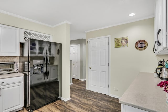 1723 Victor Ter, Gurnee, IL 60031 - kitchen featuring black fridge, dark wood finished floors, white cabinetry, baseboards, and crown molding