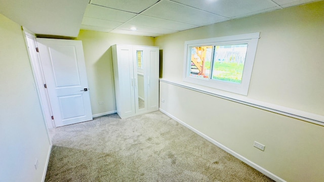 527 Northgate Rd, Lindenhurst, IL 60046 - unfurnished bedroom featuring a drop ceiling, carpet, and baseboards